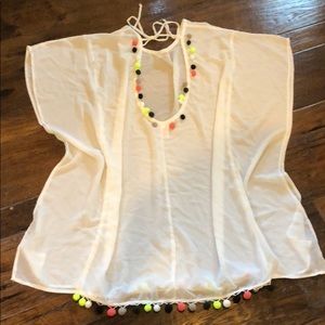 Cute swim cover up with PomPoms. Small